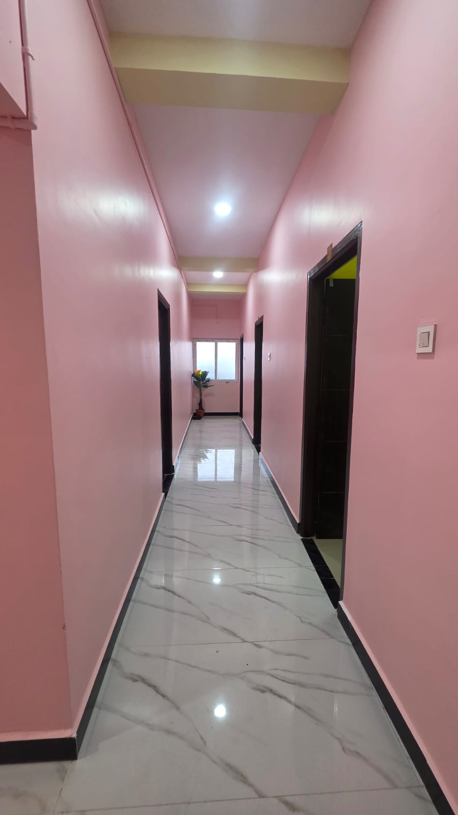Hallway View at Family Comfort Residency